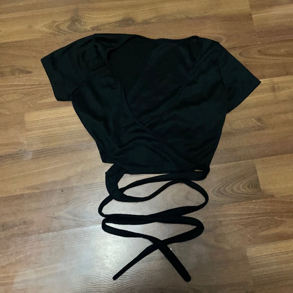 Black tie up around the waist shirt.